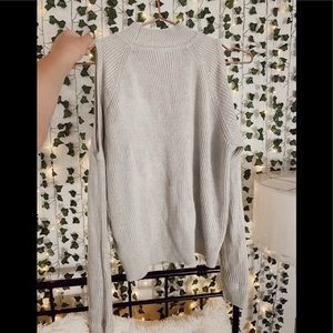Cute gray fall sweater with cut out shoulders!